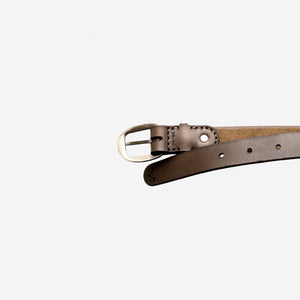 a rich brown leather belt with an aged brass buckle, etched logo and hand stitched detailing.