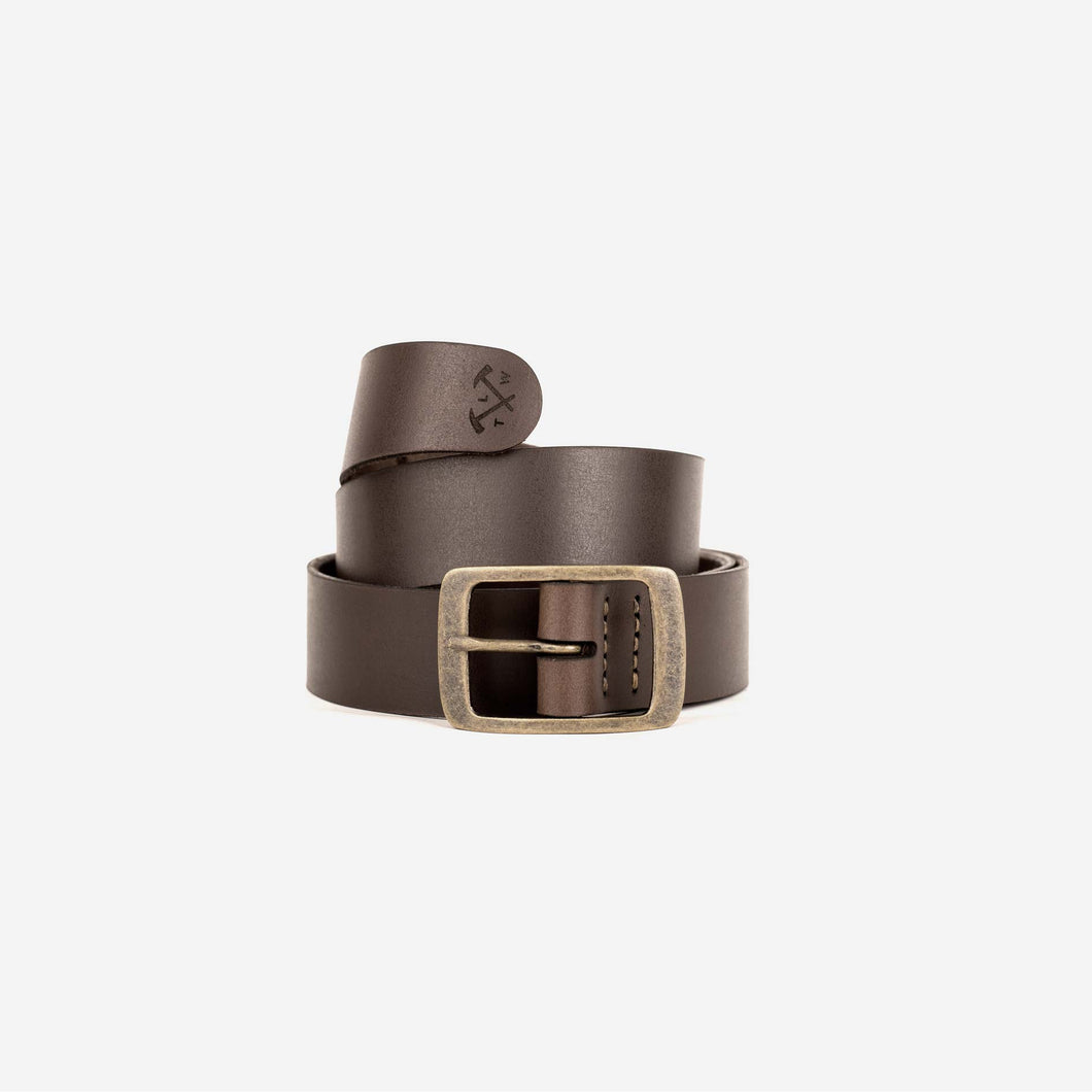 a rich brown leather belt with an aged brass buckle, etched logo and hand stitched detailing.